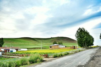 Country road passing through landscape