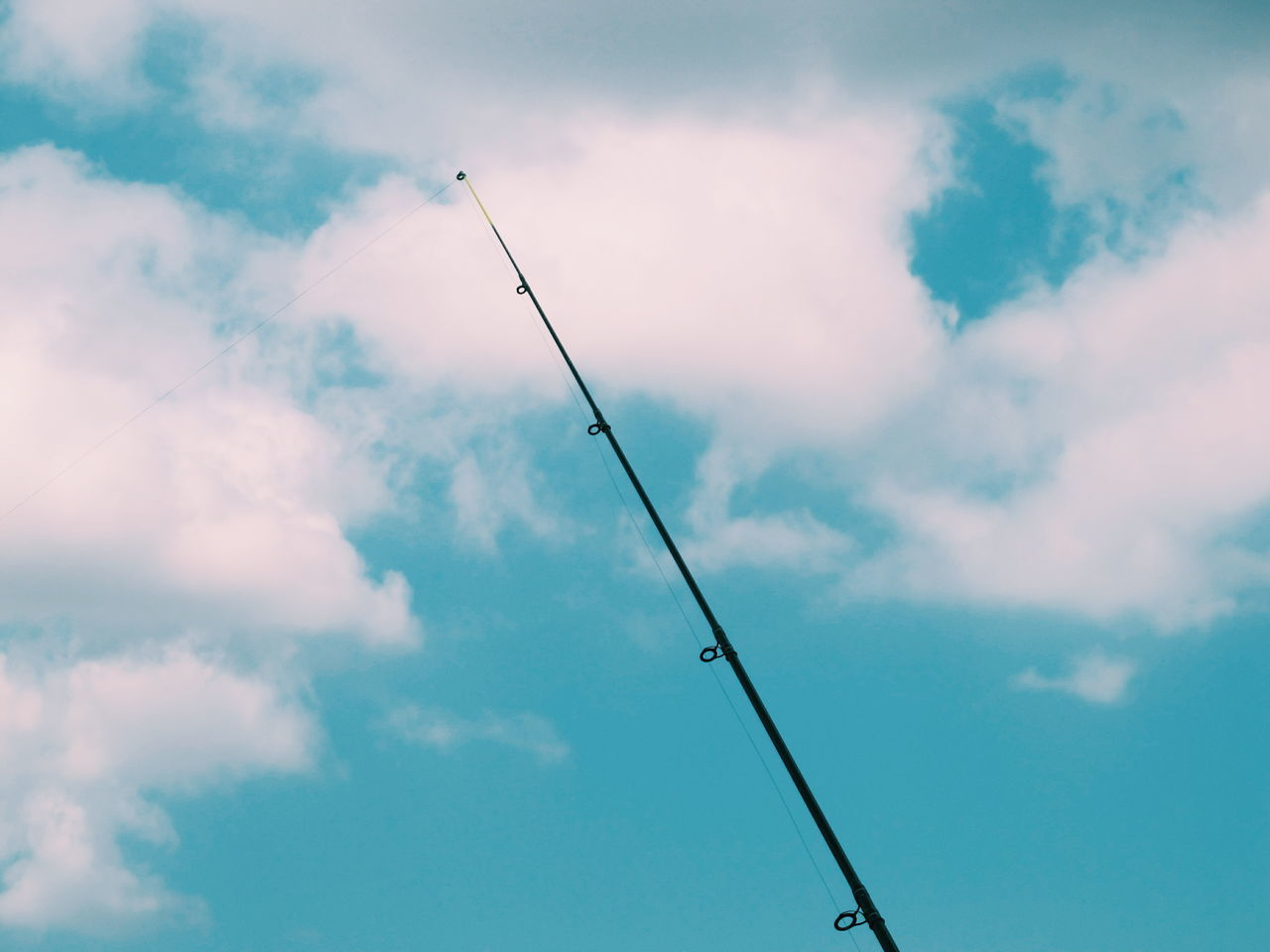 LOW ANGLE VIEW OF TELEPHONE POLE AGAINST SKY