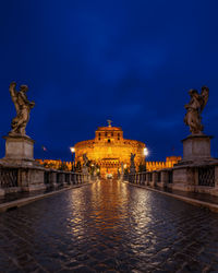 Ponte sant angelo and castel sant angelo in background, rome, italy