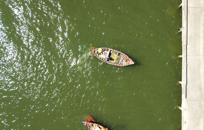 High angle view of people on boat in lake