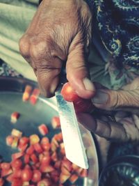 Close-up of person preparing food