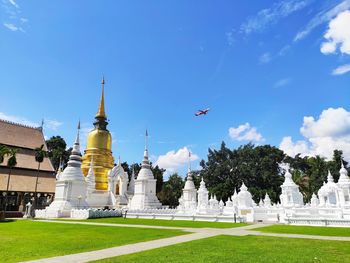 View of temple against building