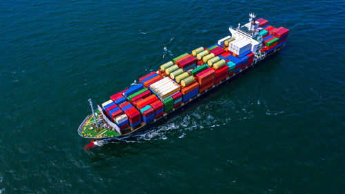 High angle view of ship sailing in sea