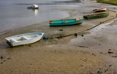 High angle view of boats moored on shore