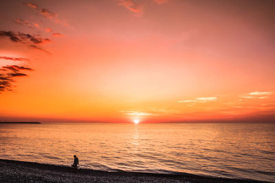 Scenic view of sunset over sea