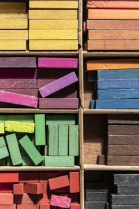 Full frame shot of colorful wooden blocks in container 