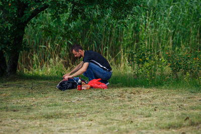 Side view of a man in the forest