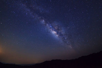 Low angle view of stars in sky at night