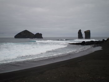 Scenic view of beach against sky