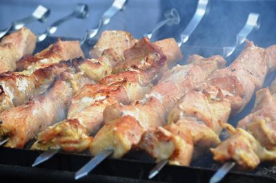 Close-up of meat on barbecue grill