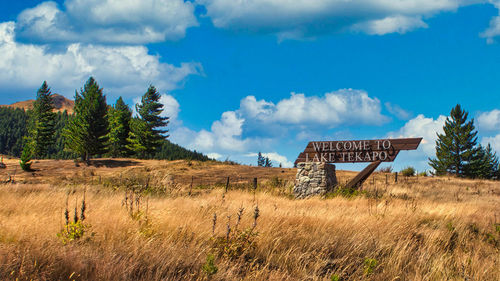 Built structure on field against sky