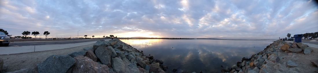 Panoramic view of sea against sky during sunset