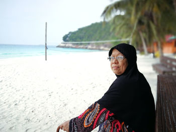 Side view of woman at beach