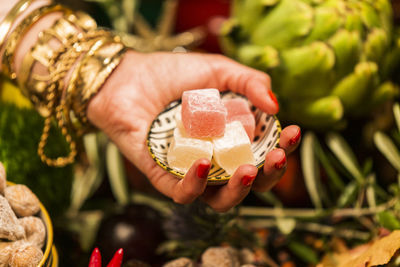 Close-up of woman holding ice cream