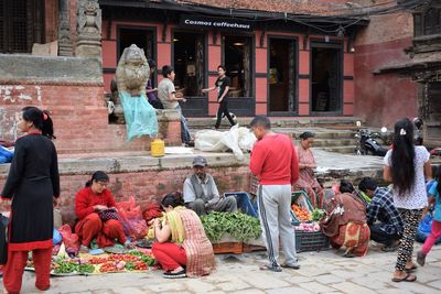 Group of people in temple outside building