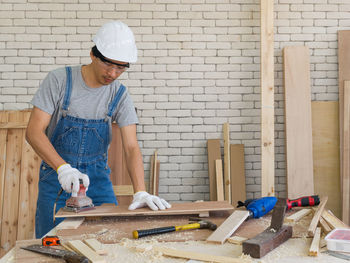 Man working on wood