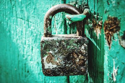 Close-up of padlock on closed door