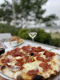 Close-up of pizza on table in restaurant