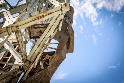 Low angle view of construction site against sky