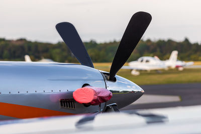 Close-up of airplane on runway