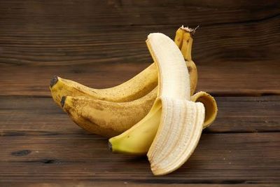 Close-up of bananas on wood