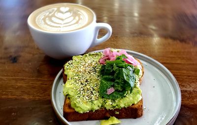 High angle view of breakfast served on table