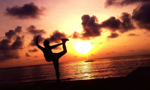 Scenic view of sea at sunset