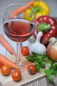 Close-up of tomatoes in glass on table