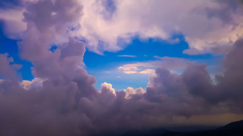 Low angle view of clouds in sky during sunset