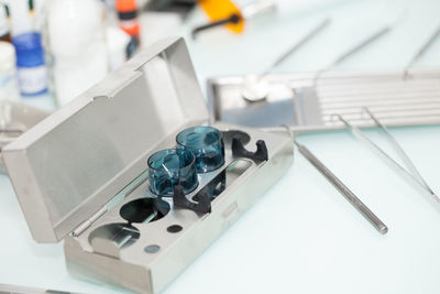 Close-up of dental equipment on table