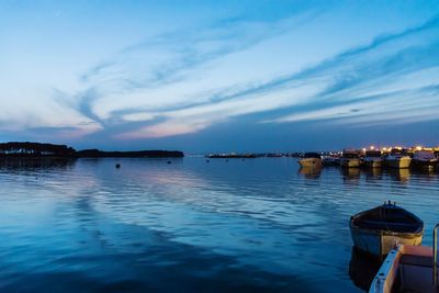 Scenic view of sea against sky at dusk