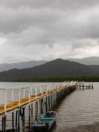 Pier on bridge against sky