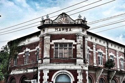 Low angle view of historic building against sky