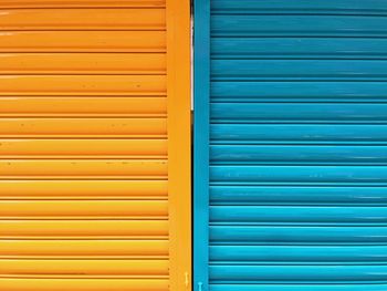 Full frame shot of yellow and blue corrugated iron