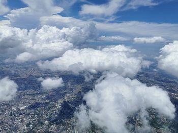 High angle view of clouds over landscape against sky