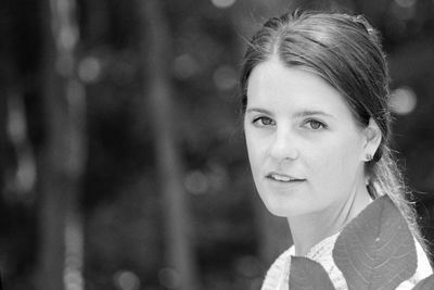 Close-up portrait of young woman outdoors