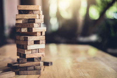 Stack of wooden toy blocks on table