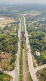 High angle view of highway amidst landscape against sky