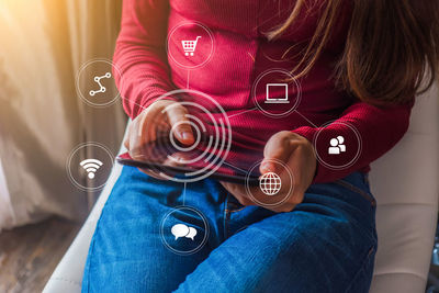 High angle view of woman using mobile phone