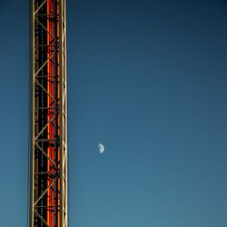 Low angle view of built structure against blue sky