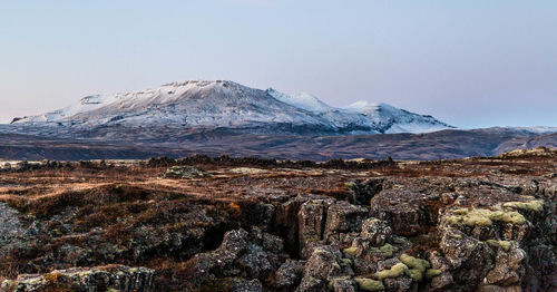 Scenic view of snowcapped mountain against sky