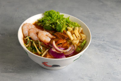 High angle view of salad in bowl on table