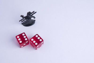 High angle view of objects on table against white background