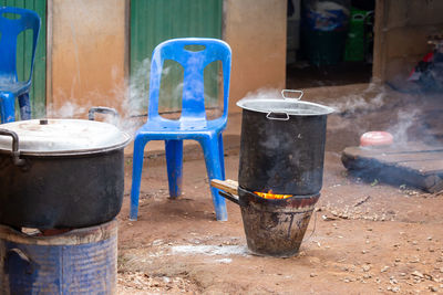 Close-up of garbage bin against building