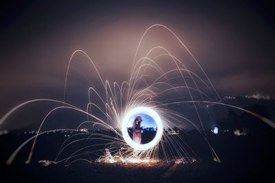 Firework display at night