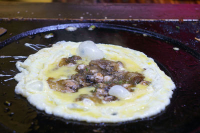 Close-up of omelet in cooking pan