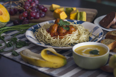 Close-up of fruits in plate on table