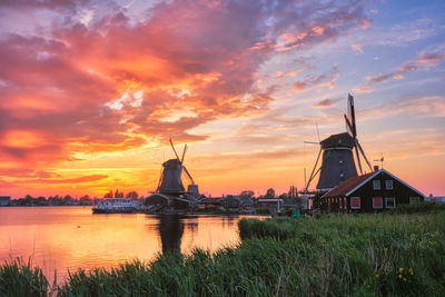 Windmills at zaanse schans in holland on sunset. zaandam, nether