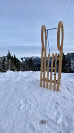 Snow on field against sky