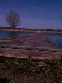 Scenic view of lake against blue sky